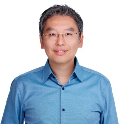 Headshot of Harris Wang in a blue shirt